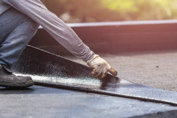 Professional Waterproofing technician working in Maple Grove, MN